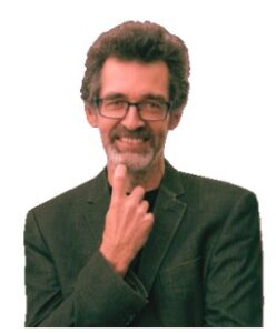 Zdjęcie przedstawia mężczyznę w okularach i garniturze.